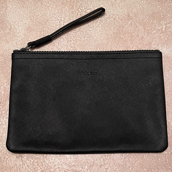 lululemon athletica Handbags - Lululemon black cosmetic bag / wristlet